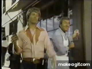 gif of a famous 1970s-1980s era Reese's commercial in which a young man accidentally dunks his chocolate bar into a woman's peanut butter. And the rest was advertising history.